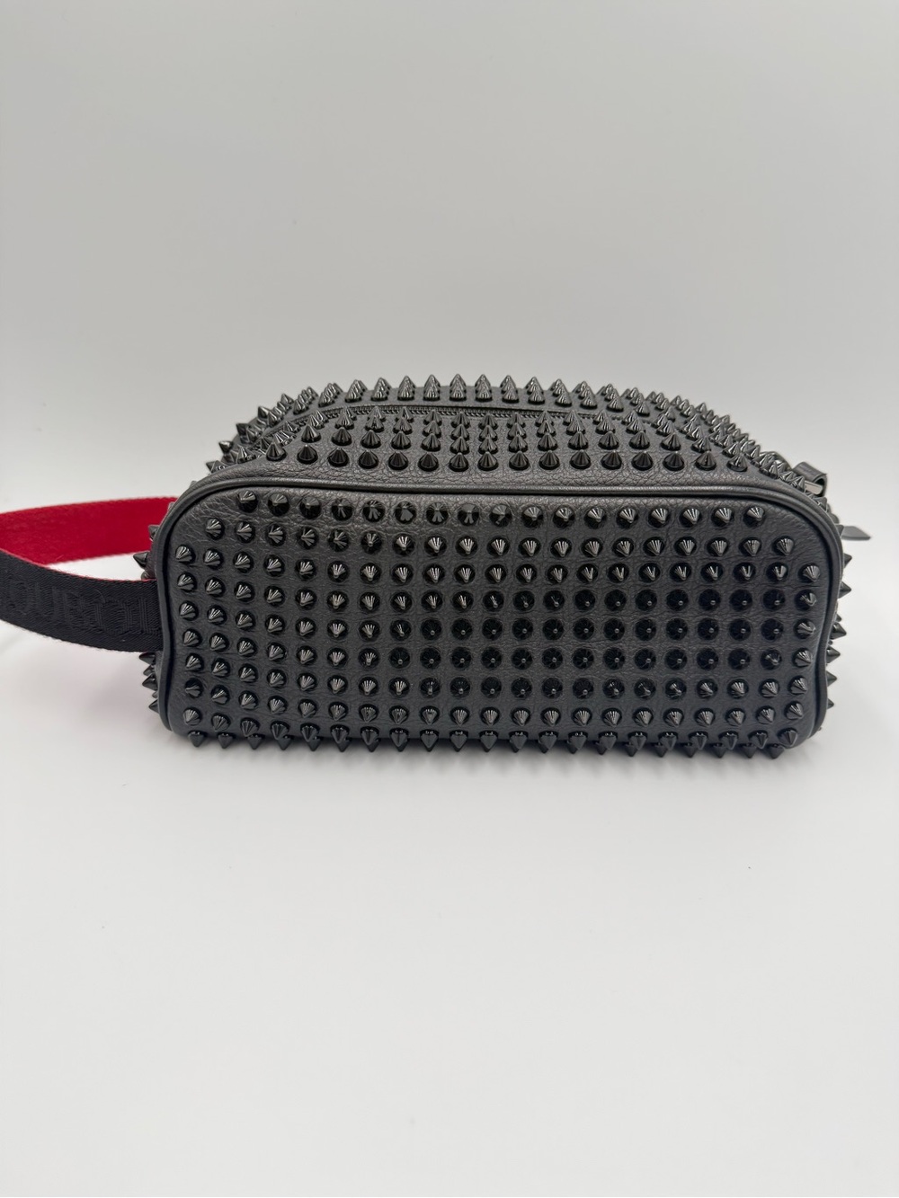 Christian Louboutin Black Studded Travel Bag with Red Strap